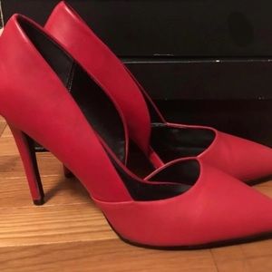Women’s red heels size 10.
